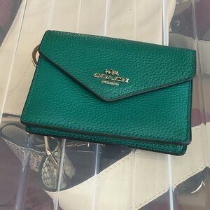 P481. Coach Teal Pebbled Leather Envelope Card Holder with Gold Logo